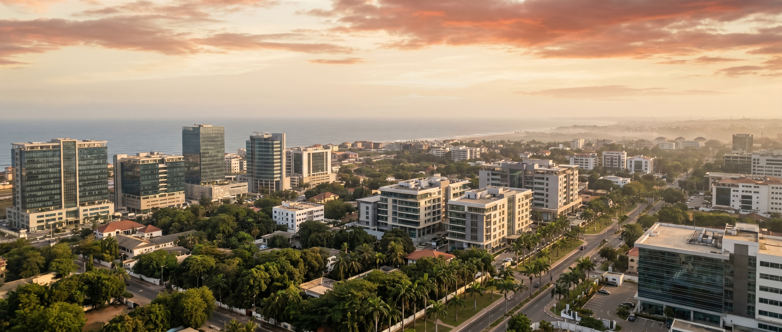 Aerial view of the modern Accra skyline at golden hour